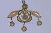 The exquisite gold pendant from Malia