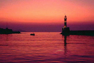 The lighthouse and the harbour at sunset, Chania