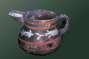 Prepalatial-style pottery with characteristic light on dark decorations