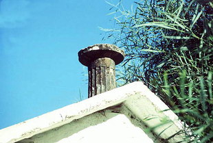 An ancient pillar as decoration on Michael Archangelos Church, Meskla