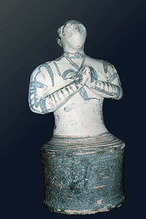 Postpalatial female statue in a worshipping position from Makrigialos